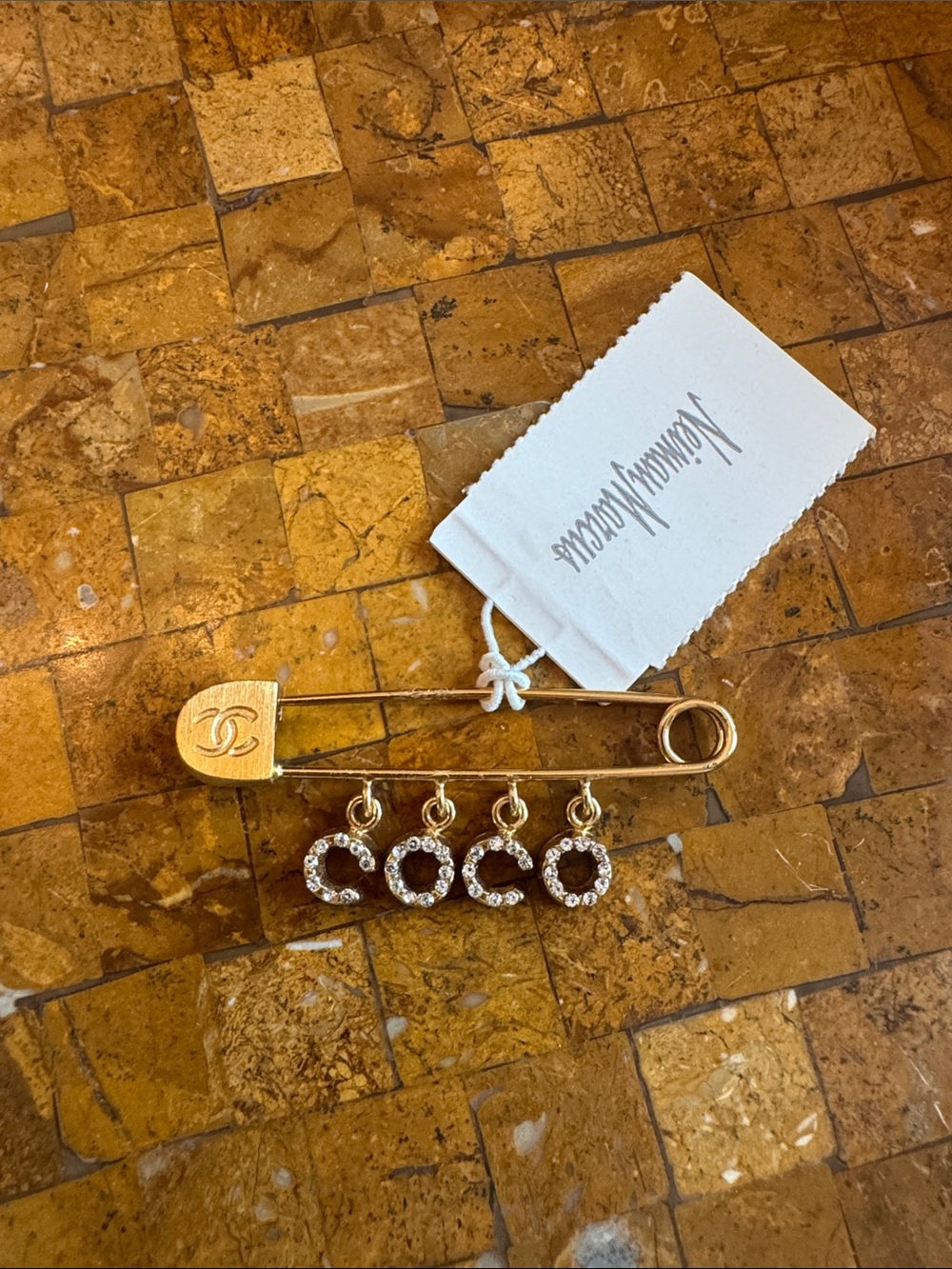 CHANEL Gold-Tone Safety Pin Brooch with Crystal COCO Charms